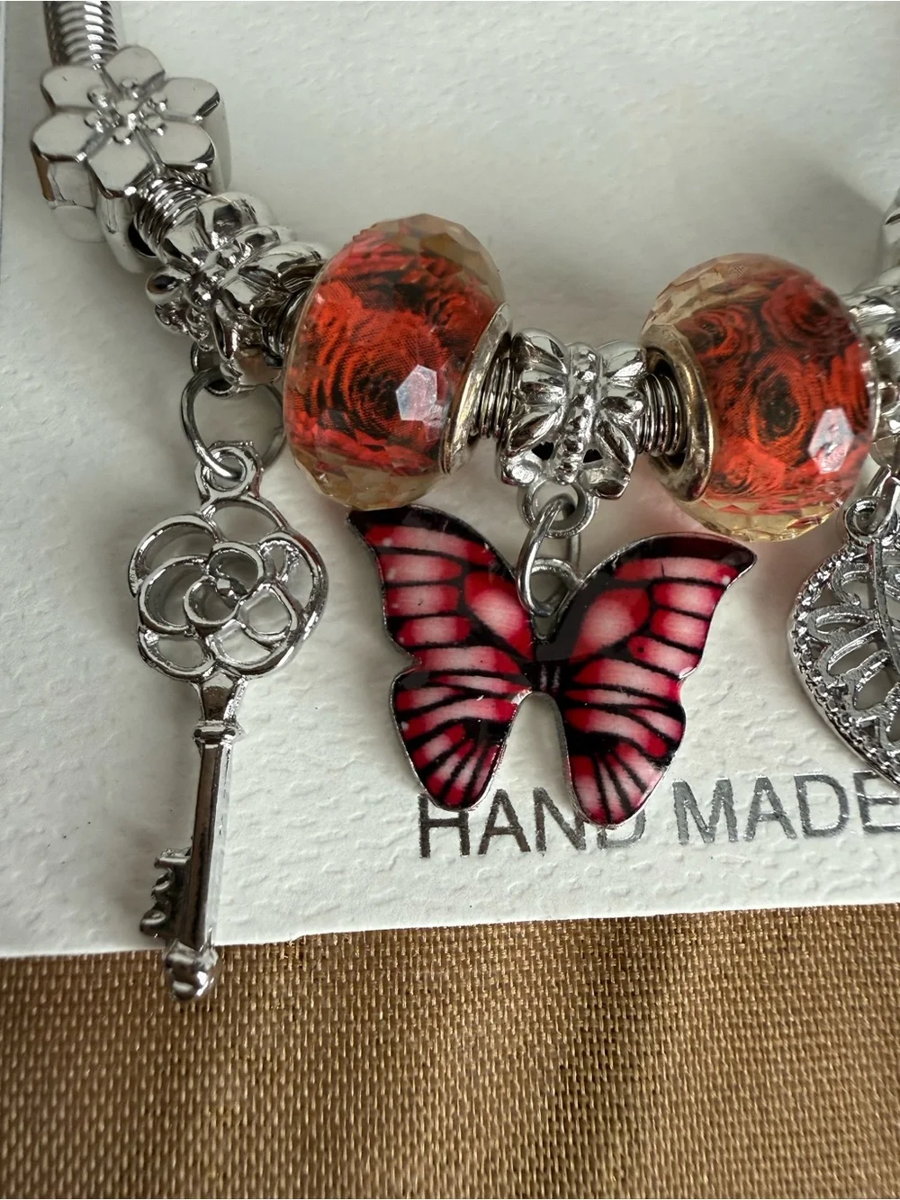 Mint Silver-Tone Charm Bracelet with Red-Pink Butterfly and Orange Beads